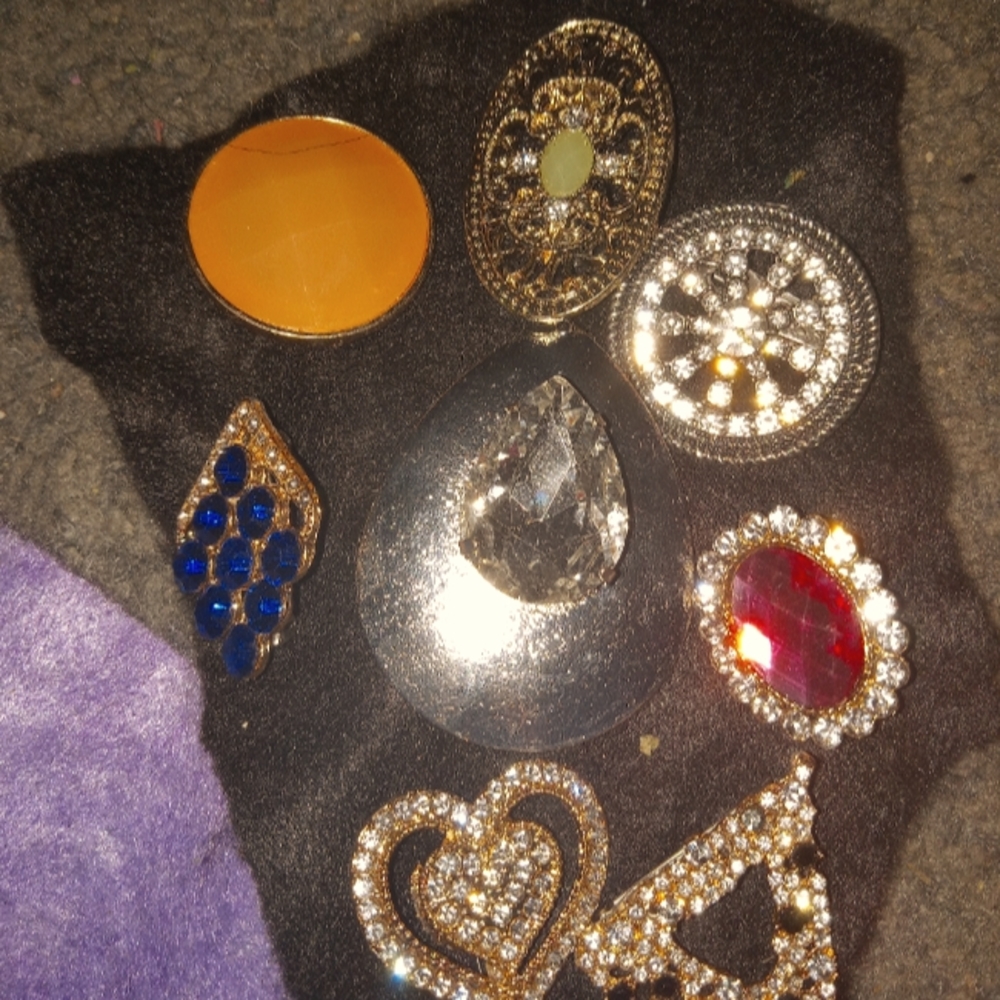 12 brooches